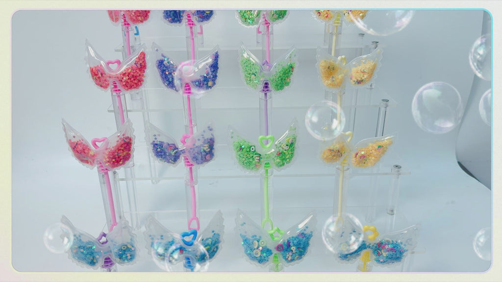 24 Pcs Wing Shaker Bubble Wands, Party Favors, Goodie Bag Fillers | Clear wing shaker toppers with moving glitter add sparkle to goodie bags, pinata fillers, dessert tables, and party setups.