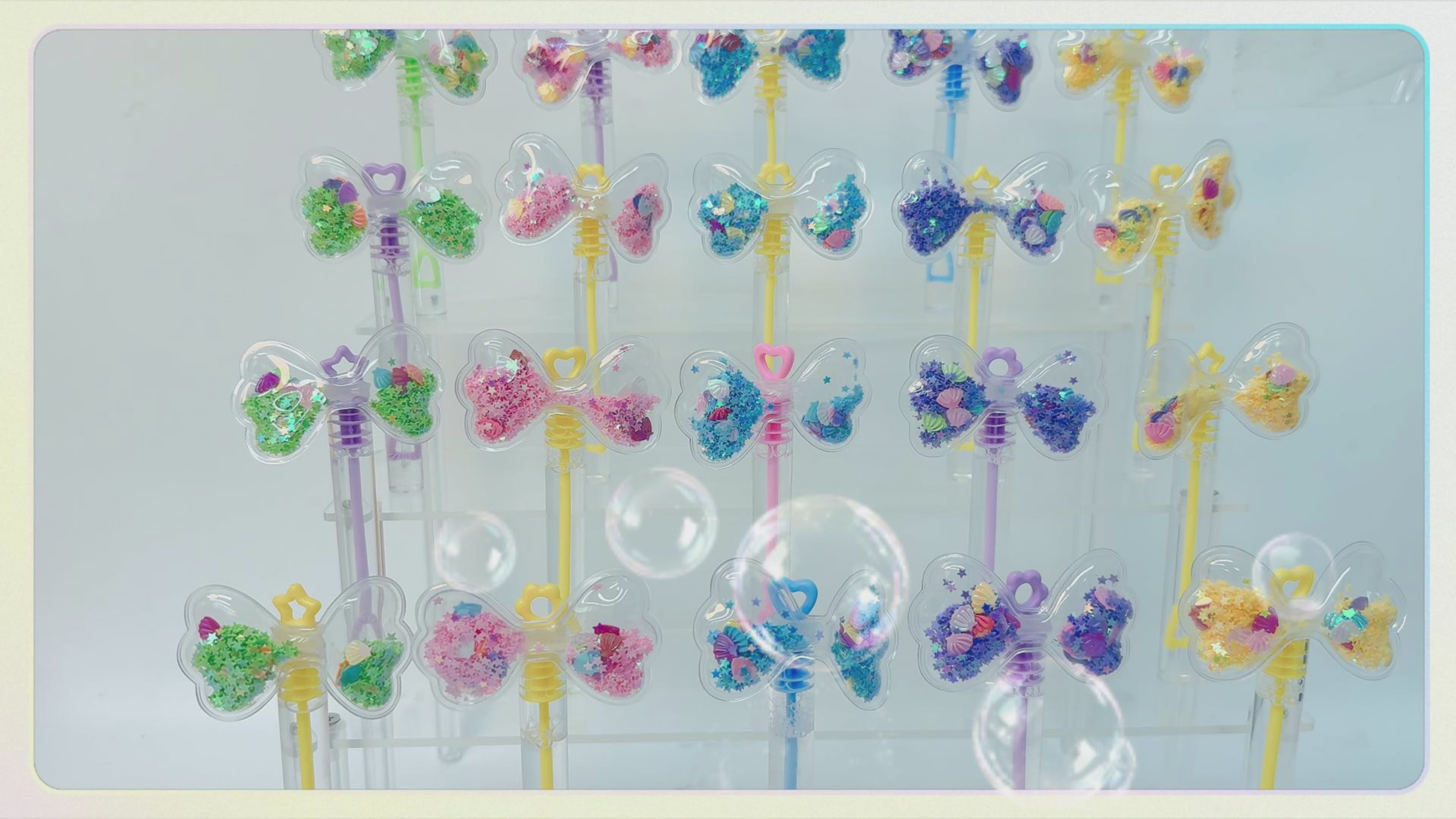 24 Pcs Bow Shaker Bubble Wands, Party Favors, Goodie Bag Fillers | Clear bow shaker bubble wands with moving glitter toppers for party favors, goodie bag fillers, favor bags and table setups